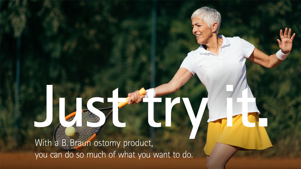 A woman with short gray hair plays tennis outdoors, dressed in a white polo and yellow skirt. The text on the image reads Just try it. With a B. Braun ostomy product, you can do so much of what you want to do. 